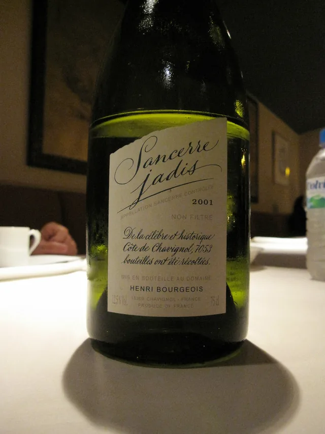 A bottle of Henri Bourgeois Sancerre Jadis 2001 on a restaurant table