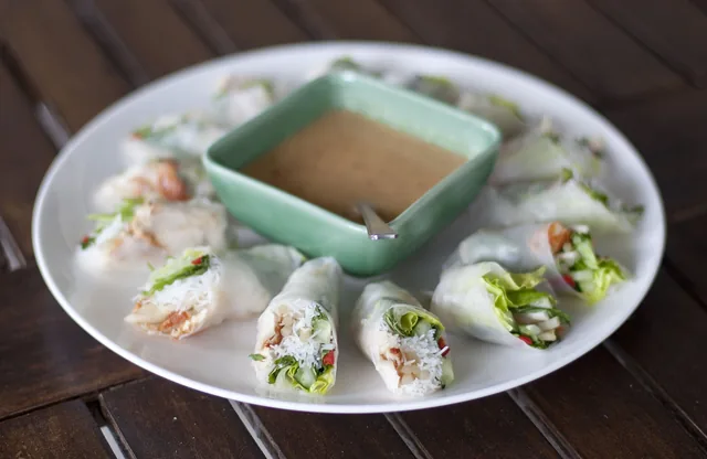 Vietnamese summer rolls with herbs and a peanut dipping sauce