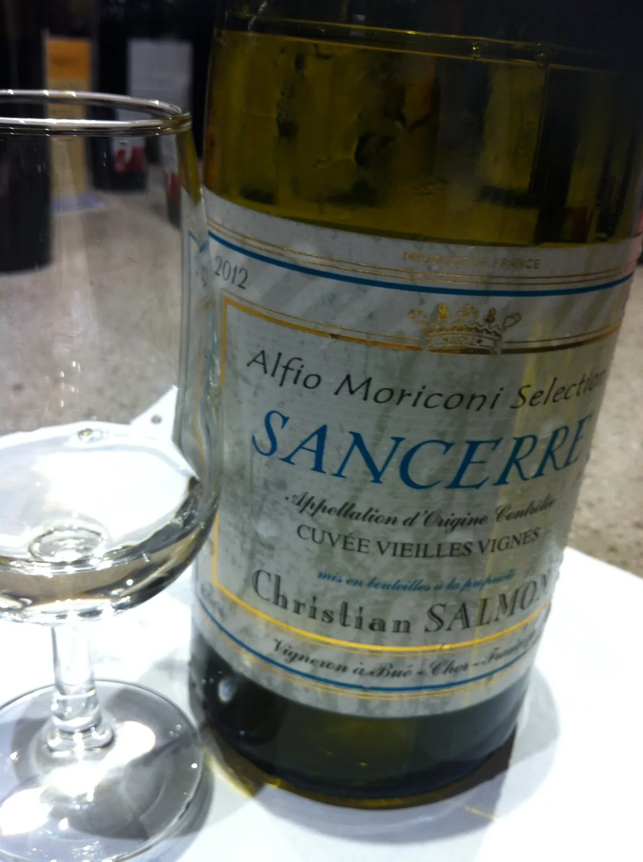 A bottle and a glass of white Sancerre